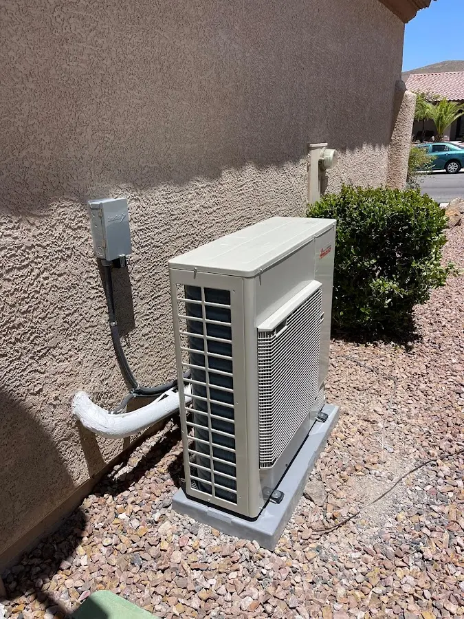 Residential air conditioning condenser unit in Kermit